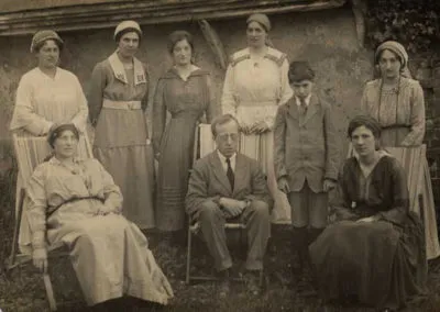 Holst with Isobel to his left with possibly Vally Lasker standing behind Isobel in Thaxted - reproduced with permission from The Holst Birthplace Trust, The Cheltenham Trust and Cheltenham Borough-Council